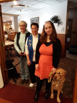 Thurber-Greenwood VFW Post 1916 Auxiliary of Reedsburg got to meet Cole, a service dog that the ogranization sponsored, and his new owner, Chris Singer who is from Baraboo.  Also in attendance was Heather Johnson who is from Reedsburg, owner of her service dog named Vinnie.  President Janet Montgomery of the Auxiliary is pictured here in her blue vest. (Submitted photo)