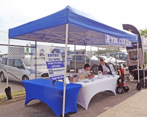 The Reedsburg Area Flying Club organizes the Fly-In, Drive-In Breakfast. The group had a booth at the event to provide more information.