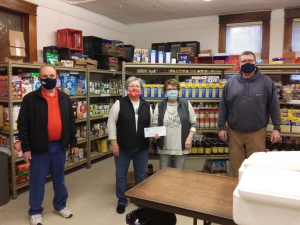 2021 marks the 70th anniversary of the Reedsburg Lions and the club kicked off the year by donating to the Reedsburg Area Food Pantry. Pictured are Mike Gargano, far left, and Phil Peterson, far right, of the Lions Club, presenting a check for $5,000 to Sandy Hein, left, and Shirley Henry of the Pantry. In 2020, the club donated $16,000 overall to the pantry. The Lions Club is committed to supporting scholarships, youth sports, eye screening, the new high school athletic facility, the Boys and Girls Club an